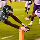 Wendell Smallwood dives for the two-point conversion to cut the Eagles’ deficit to 6 points.